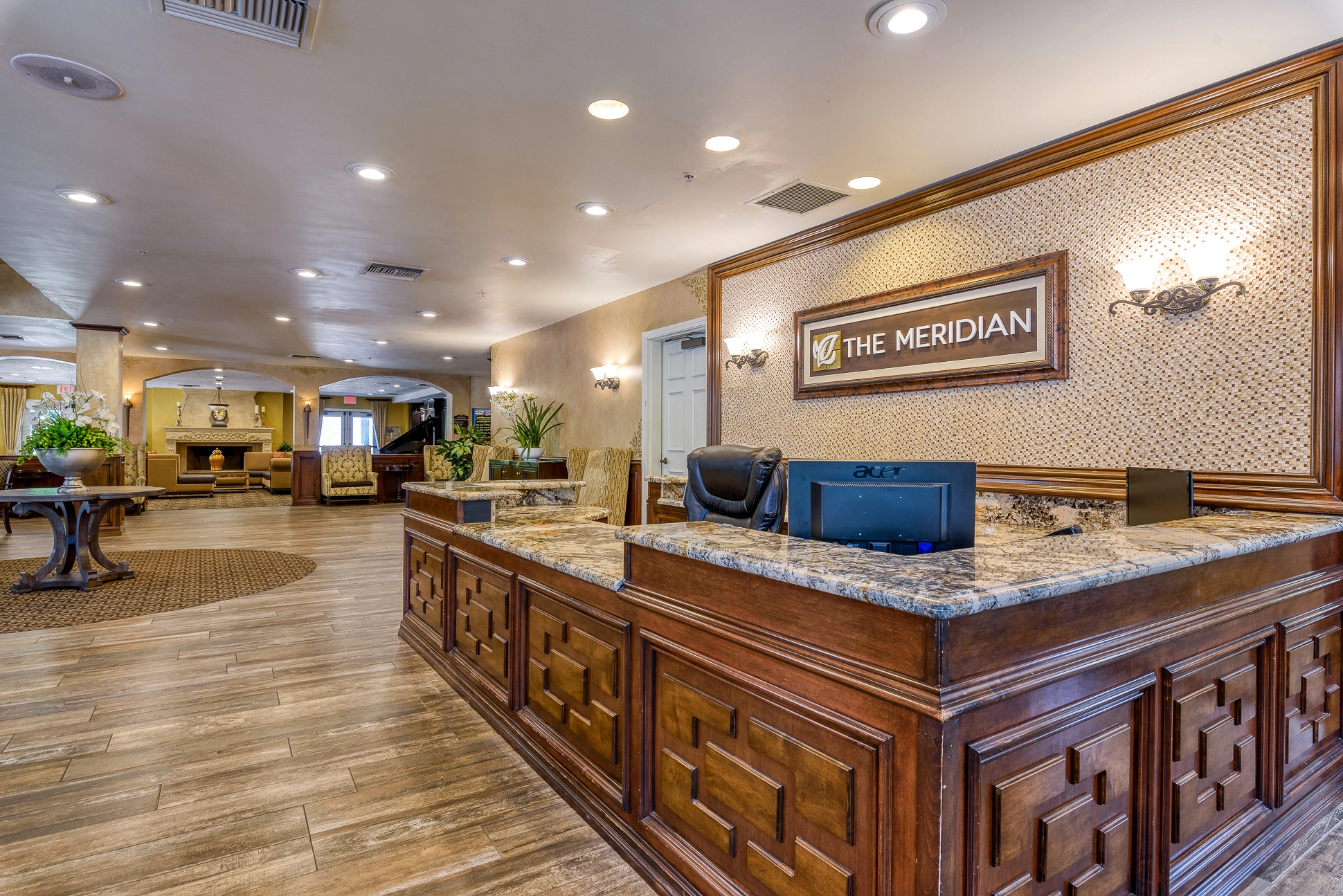 PSLAnaheimL-2 lobby area with brown concierge desk
